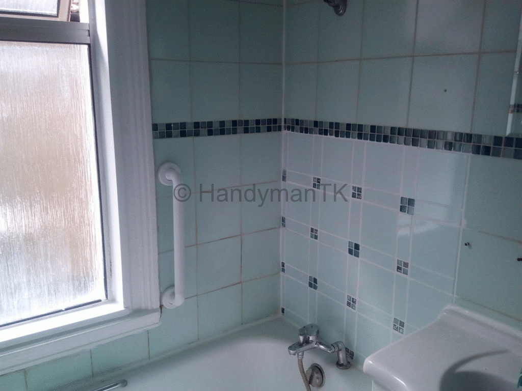 HandymanTK retiles bathroom wall