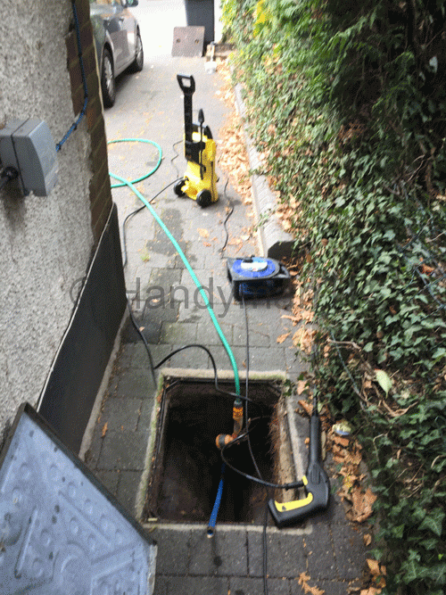 HandymanTK cleaning a manhole