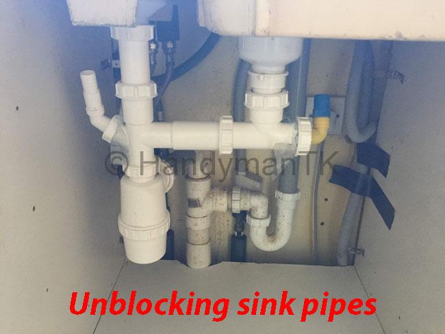 HandymanTK plumber unblocking sink pipes